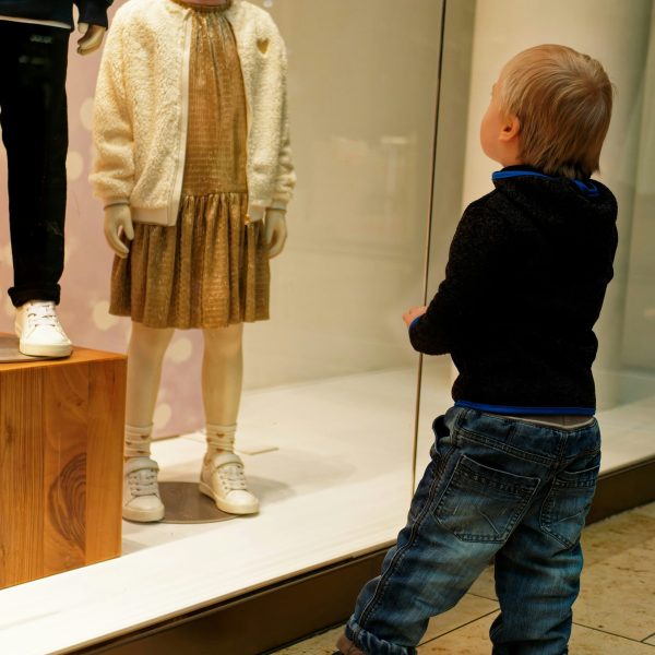 child observes outfit